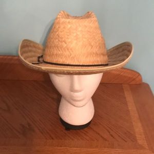 Straw cowboy hat with brown tie